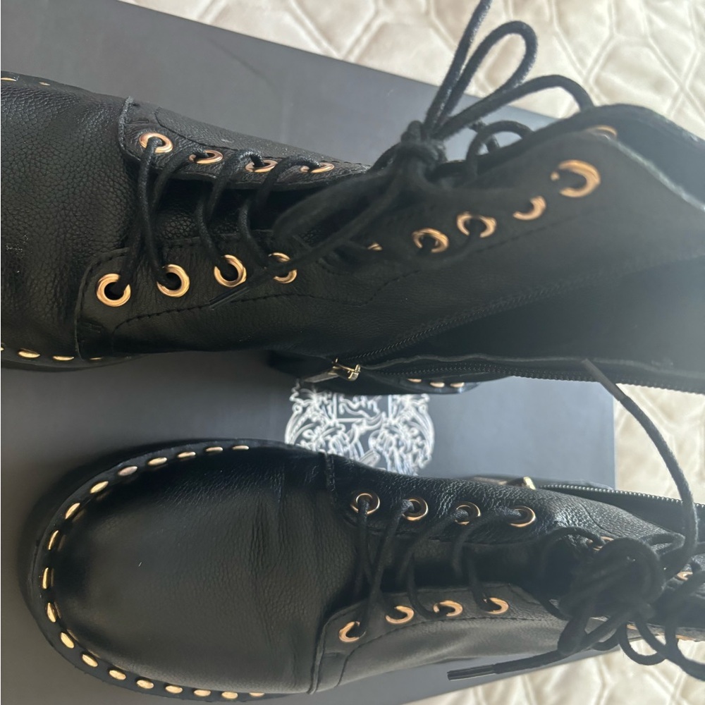 Women Vince Camuto combat boots. Worn once. Black leather size 7.5